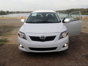 продам автомобиль Toyota corolla 2009г.в.цена-24000$, цвет белый,все опции...... - Изображение #1, Объявление #132783
